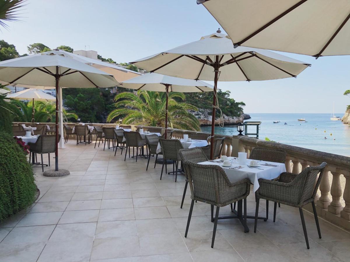Hotel Apartamentos Cala Сантаний Екстериор снимка